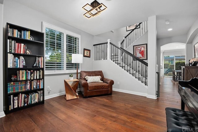 923 Citrine Way, San Marcos, CA 92078 - living area with wood-type flooring, arched walkways, and stairs