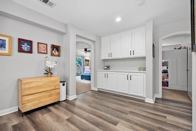 923 Citrine Way, San Marcos, CA 92078 - bar area featuring dark wood finished floors, recessed lighting, ceiling fan, and arched walkways