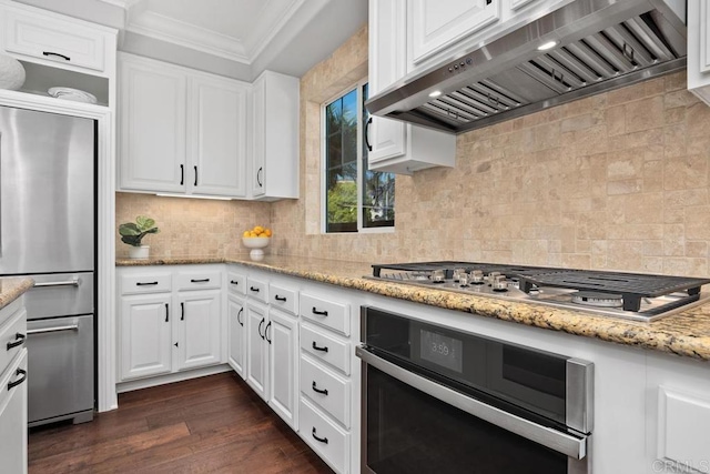 923 Citrine Way, San Marcos, CA 92078 - kitchen featuring stainless steel appliances, range hood, crown molding, decorative backsplash, and white cabinetry