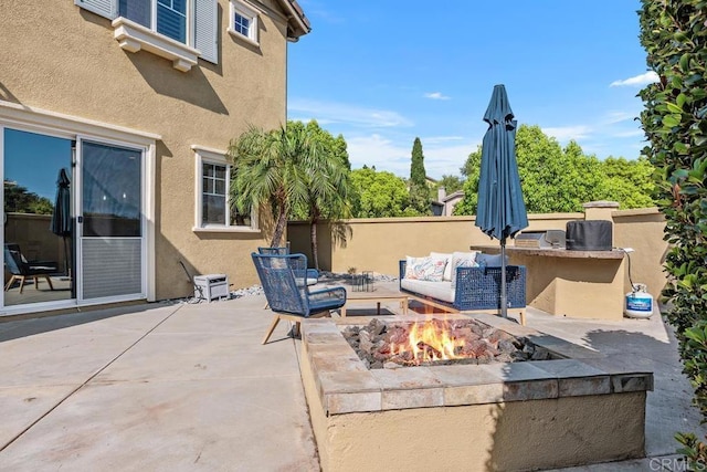 923 Citrine Way, San Marcos, CA 92078 - view of patio / terrace with a fire pit