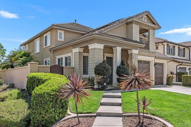 923 Citrine Way, San Marcos, CA 92078 - view of front of home featuring a garage, concrete driveway, a balcony, and stucco siding
