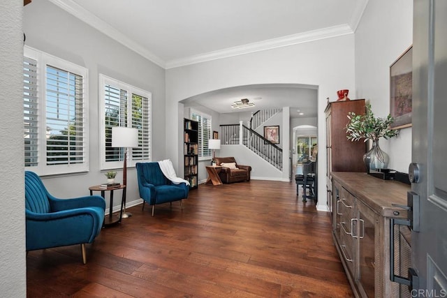 923 Citrine Way, San Marcos, CA 92078 - sitting room featuring arched walkways, stairway, ornamental molding, and dark wood finished floors