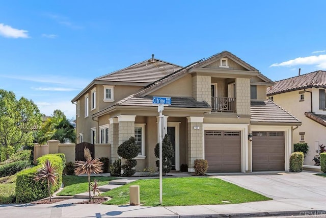 923 Citrine Way, San Marcos, CA 92078 - view of front of house with driveway, a balcony, an attached garage, and stucco siding