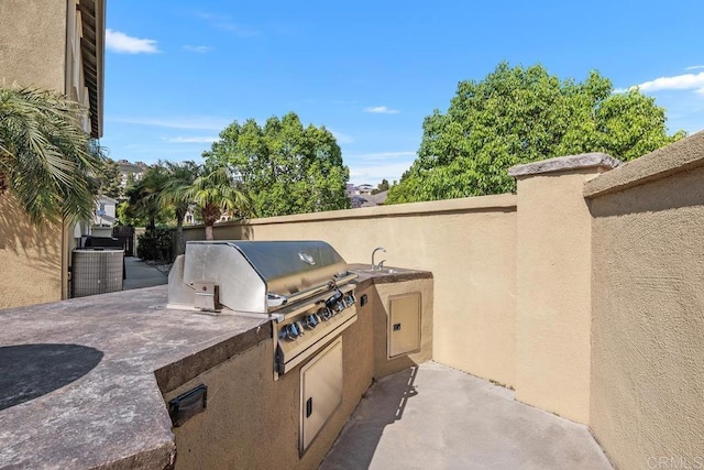 923 Citrine Way, San Marcos, CA 92078 - view of patio / terrace featuring an outdoor kitchen