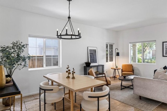 35733 Emily Ave, Murrieta, CA 92563 - dining room with a chandelier, light tile patterned floors, and healthy amount of natural light