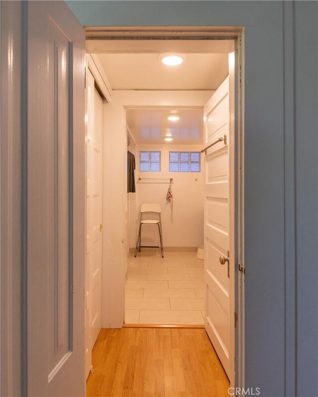 320 W 21st St, Merced, CA 95340 - corridor featuring light wood-style flooring