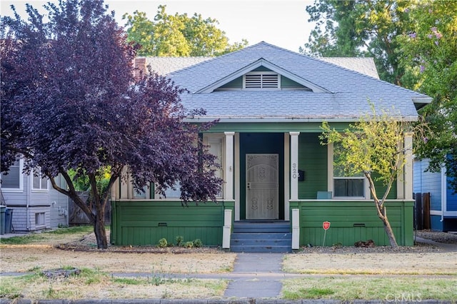 320 W 21st St, Merced, CA 95340 - view of front of house featuring roof with shingles