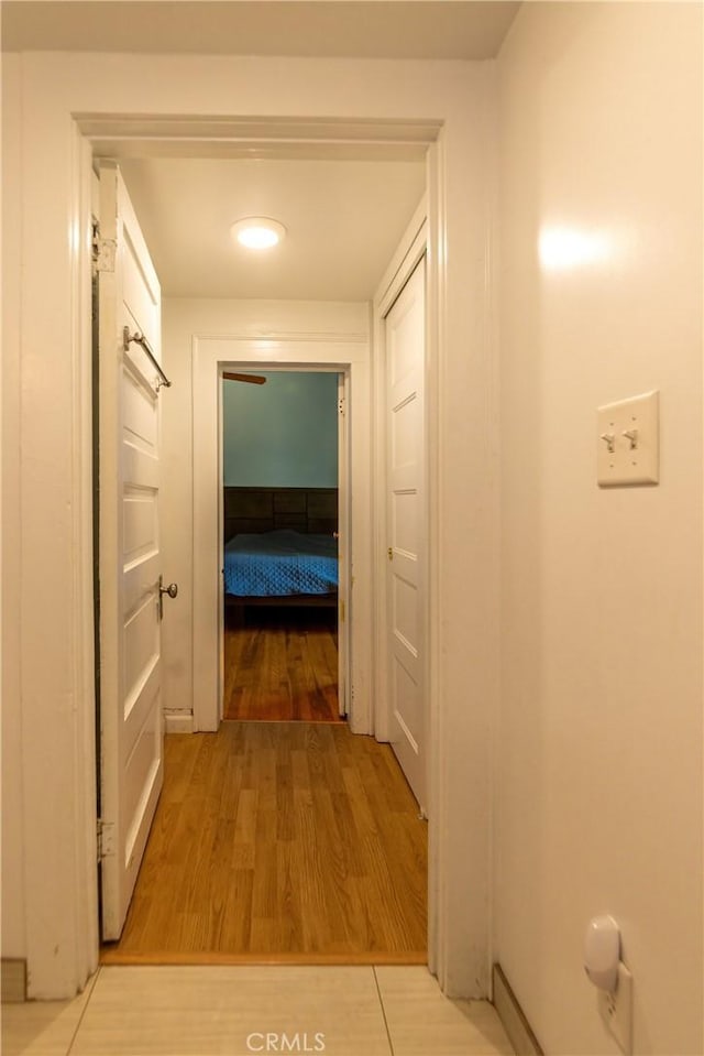 320 W 21st St, Merced, CA 95340 - corridor featuring light wood-style floors