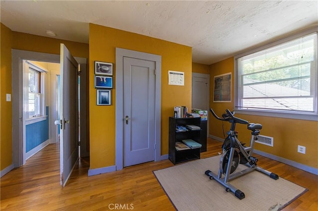 320 W 21st St, Merced, CA 95340 - exercise area with light wood-style floors