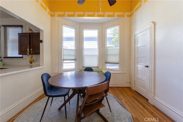 320 W 21st St, Merced, CA 95340 - dining area featuring light wood-style flooring and healthy amount of natural light