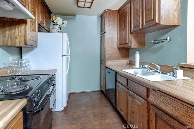 3961 Via Marisol Unit 233, Los Angeles, CA 90042 - kitchen featuring black / electric stove, stainless steel dishwasher, under cabinet range hood, light countertops, and dark wood-type flooring