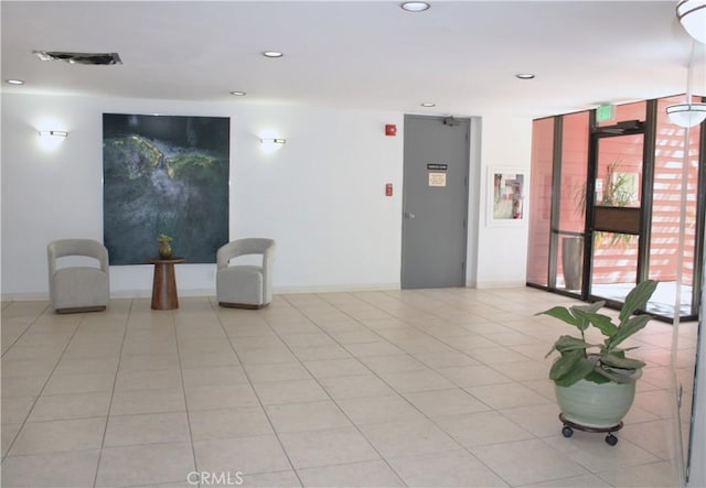 3961 Via Marisol Unit 233, Los Angeles, CA 90042 - community lobby featuring expansive windows and recessed lighting