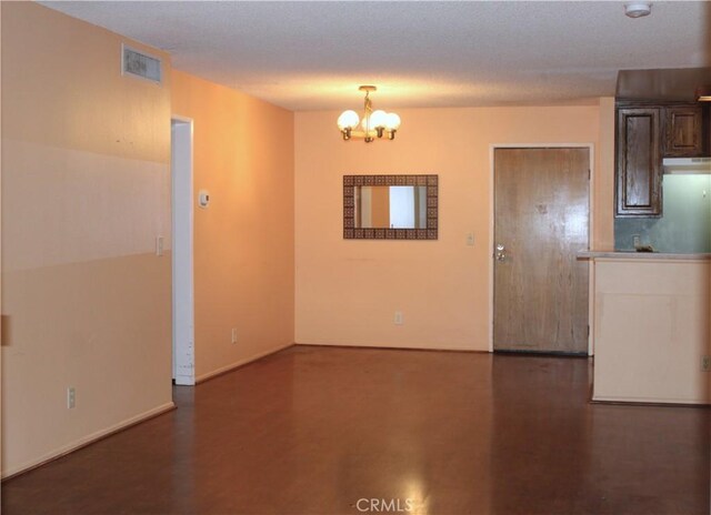 3961 Via Marisol Unit 233, Los Angeles, CA 90042 - unfurnished room featuring a chandelier