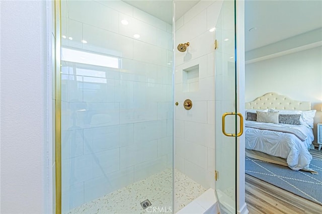 27505 Illumination Ct, Valencia, CA 91381 - ensuite bathroom with a shower stall and wood finished floors