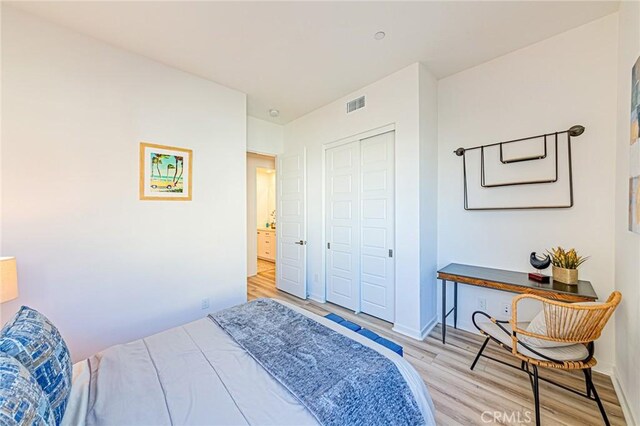 27505 Illumination Ct, Valencia, CA 91381 - bedroom with light wood-style floors and a closet