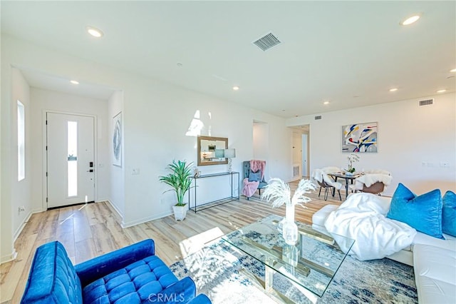 27505 Illumination Ct, Valencia, CA 91381 - living room featuring light wood-style flooring and recessed lighting