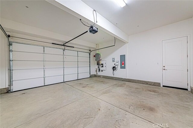 27505 Illumination Ct, Valencia, CA 91381 - garage with electric panel and a garage door opener