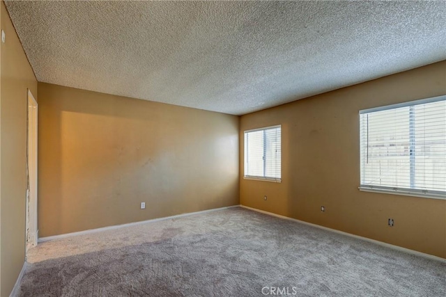 5943 Sky Meadow St, Jurupa Valley, CA 92509 - unfurnished room featuring carpet floors and a textured ceiling