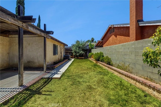 5943 Sky Meadow St, Jurupa Valley, CA 92509 - fenced backyard with a patio