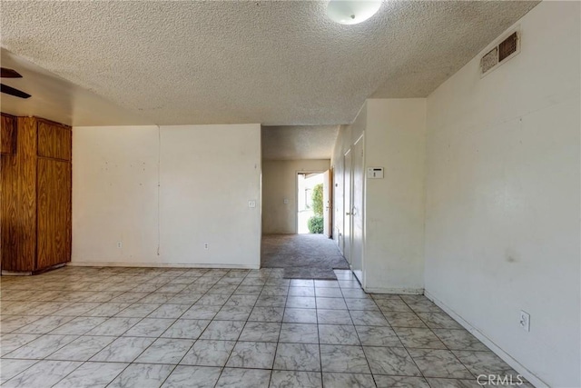 5943 Sky Meadow St, Jurupa Valley, CA 92509 - unfurnished room featuring a textured ceiling