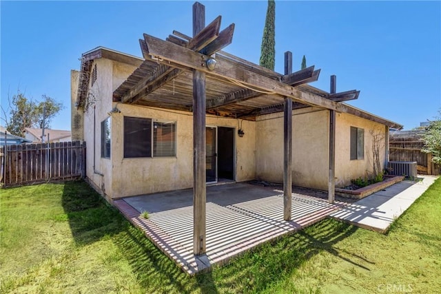 5943 Sky Meadow St, Jurupa Valley, CA 92509 - rear view of house featuring stucco siding, a patio area, and a pergola