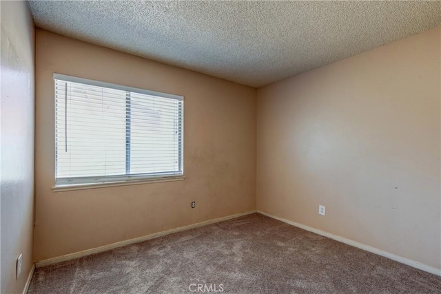 5943 Sky Meadow St, Jurupa Valley, CA 92509 - carpeted spare room with a textured ceiling and baseboards