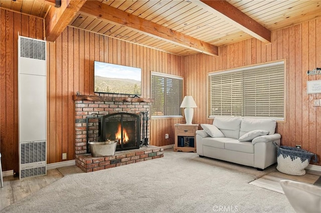 33712 Green Valley Lake Rd, Green Valley Lake, CA 92341 - living room with a heating unit, wooden walls, a wood ceiling with exposed beams, and a fireplace