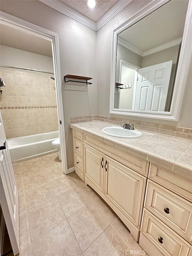 2200 Woodside Ln Unit 2, Sacramento, CA 95825 - full bath featuring vanity, ornamental molding, washtub / shower combination, and tile patterned floors