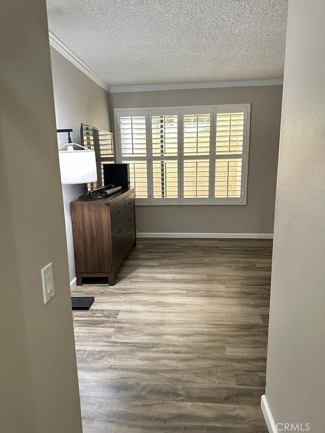 2200 Woodside Ln Unit 2, Sacramento, CA 95825 - office featuring ornamental molding, a textured ceiling, and wood finished floors