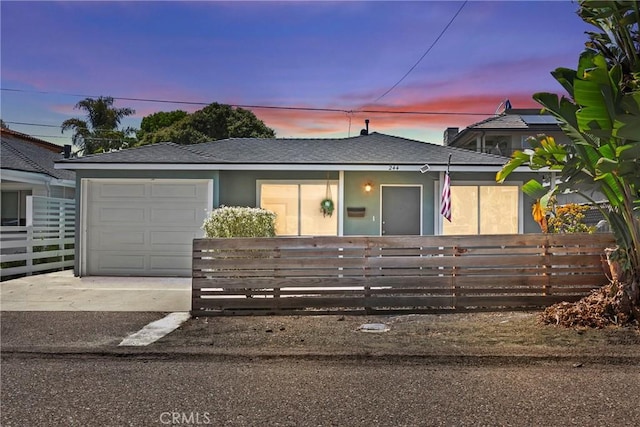 244 Santa Fe Ave, Pismo Beach, CA 93449 - view of front of property with concrete driveway, a garage, roof with shingles, and stucco siding