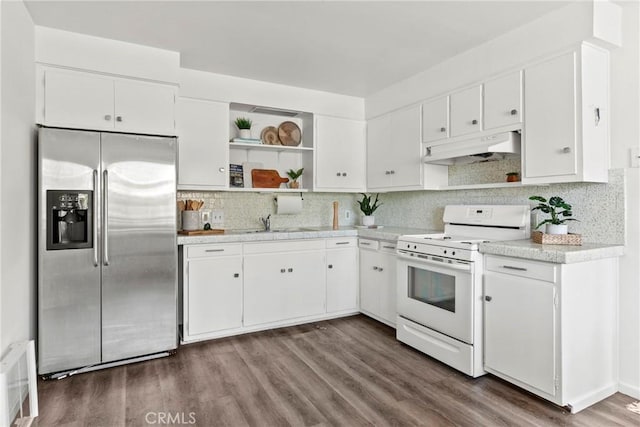 244 Santa Fe Ave, Pismo Beach, CA 93449 - kitchen featuring stainless steel refrigerator with ice dispenser, white range, under cabinet range hood, open shelves, and light countertops