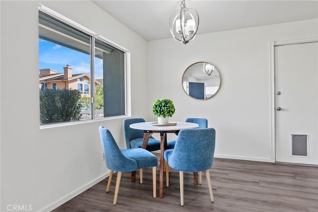 244 Santa Fe Ave, Pismo Beach, CA 93449 - dining space featuring wood finished floors and a chandelier