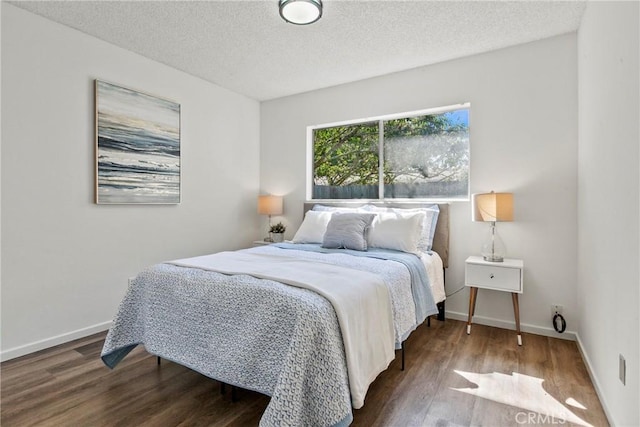 244 Santa Fe Ave, Pismo Beach, CA 93449 - bedroom with wood finished floors and a textured ceiling