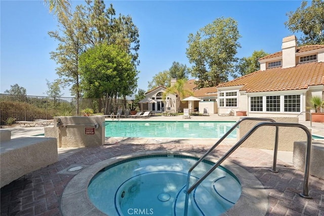 4240 Lost Hills Rd Unit 2205, Calabasas, CA 91301 - community pool featuring a hot tub and a patio