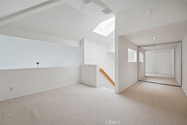 4240 Lost Hills Rd Unit 2205, Calabasas, CA 91301 - unfurnished room featuring carpet, lofted ceiling, a smoke detector, a skylight, and recessed lighting