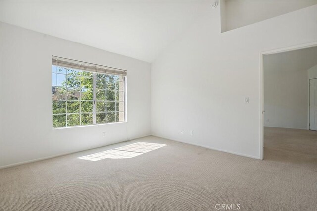 4240 Lost Hills Rd Unit 2205, Calabasas, CA 91301 - spare room featuring carpet and high vaulted ceiling