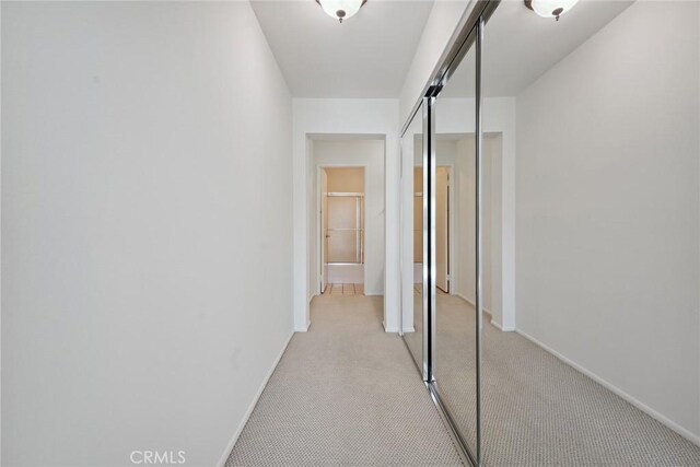 4240 Lost Hills Rd Unit 2205, Calabasas, CA 91301 - hall with light carpet and baseboards