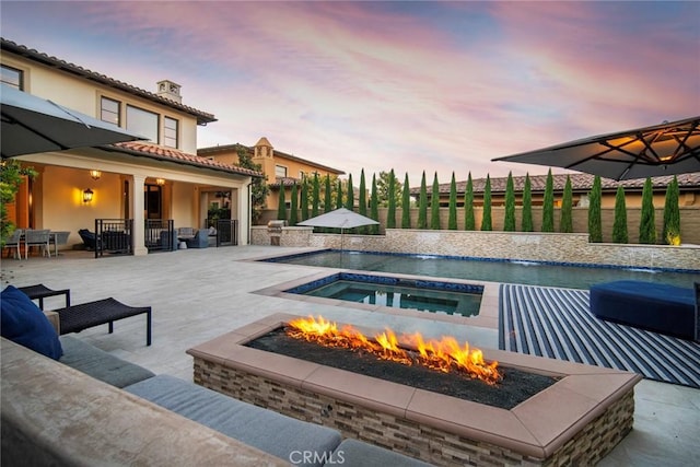 16 Seawatch, Newport Coast, CA 92657 - outdoor pool with a fire pit, an in-ground hot tub, a patio area, and a fenced backyard