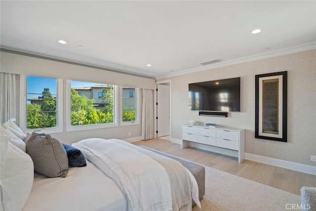 16 Seawatch, Newport Coast, CA 92657 - bedroom featuring light wood finished floors, crown molding, and recessed lighting