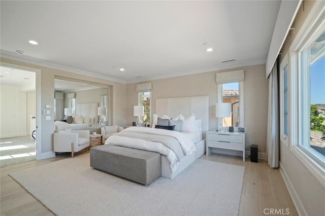 16 Seawatch, Newport Coast, CA 92657 - bedroom featuring light wood finished floors, ornamental molding, and recessed lighting
