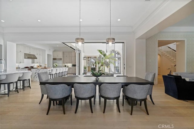 16 Seawatch, Newport Coast, CA 92657 - dining space with stairs, light wood-type flooring, and ornamental molding