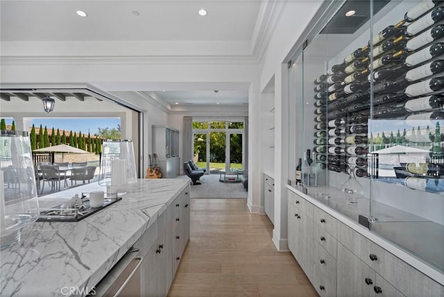 16 Seawatch, Newport Coast, CA 92657 - wine area featuring ornamental molding, light wood finished floors, recessed lighting, and a tray ceiling