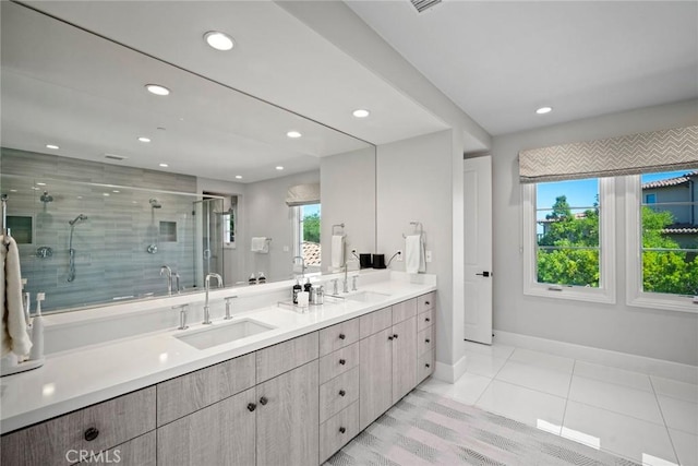 16 Seawatch, Newport Coast, CA 92657 - full bathroom with double vanity, a stall shower, recessed lighting, and tile patterned flooring