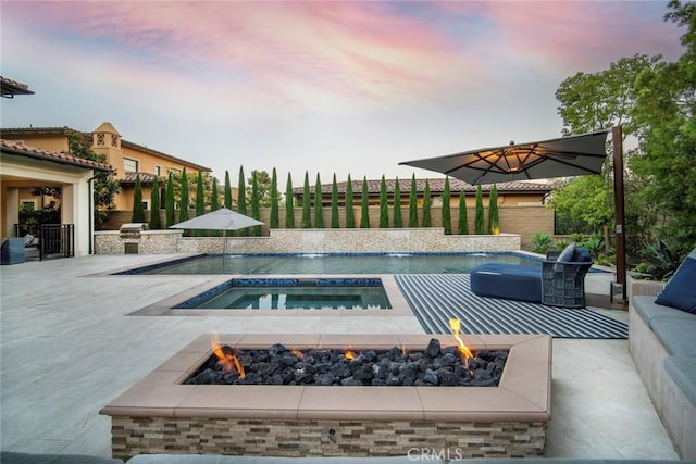 16 Seawatch, Newport Coast, CA 92657 - outdoor pool featuring a fire pit, an in-ground hot tub, and a patio area
