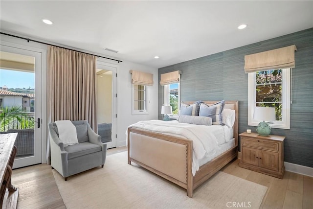 16 Seawatch, Newport Coast, CA 92657 - bedroom featuring access to outside, light wood-style flooring, recessed lighting, and wallpapered walls