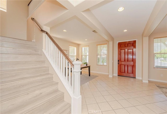 25228 Coral Canyon Rd, Corona, CA 92883 - foyer with light tile patterned floors, stairs, and recessed lighting