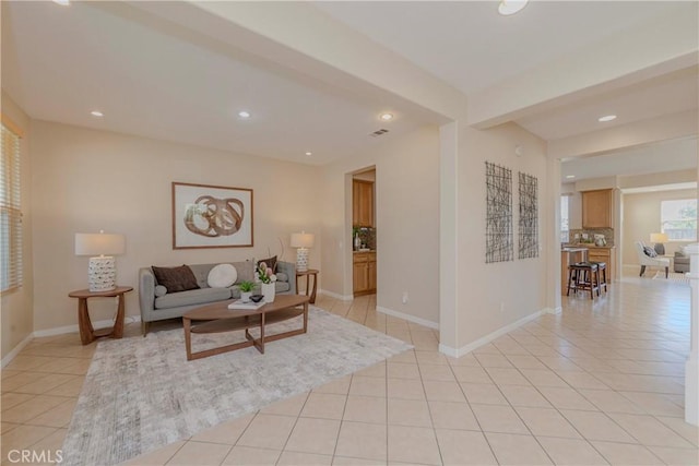 25228 Coral Canyon Rd, Corona, CA 92883 - living room with light tile patterned floors and recessed lighting