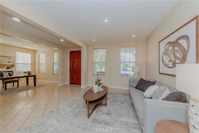 25228 Coral Canyon Rd, Corona, CA 92883 - living room with recessed lighting, light tile patterned floors, and a desk