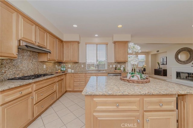 25228 Coral Canyon Rd, Corona, CA 92883 - kitchen with light brown cabinetry, stainless steel appliances, light tile patterned flooring, tasteful backsplash, and recessed lighting