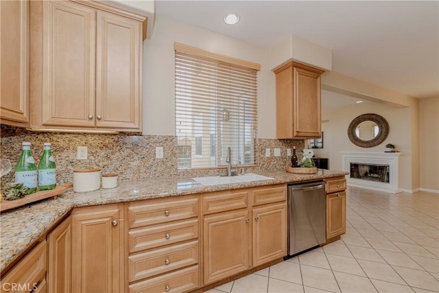 25228 Coral Canyon Rd, Corona, CA 92883 - kitchen with stainless steel dishwasher, decorative backsplash, light tile patterned flooring, light brown cabinets, and recessed lighting